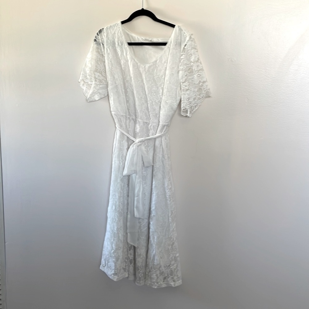 Worn once for my own bridal shower. Stretchy lace and extremely comfortable!